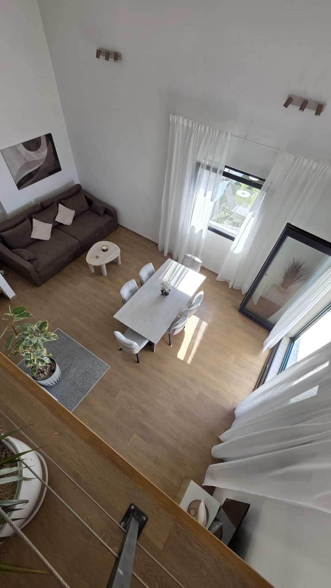 MareVista living room with sofa and terrace doors